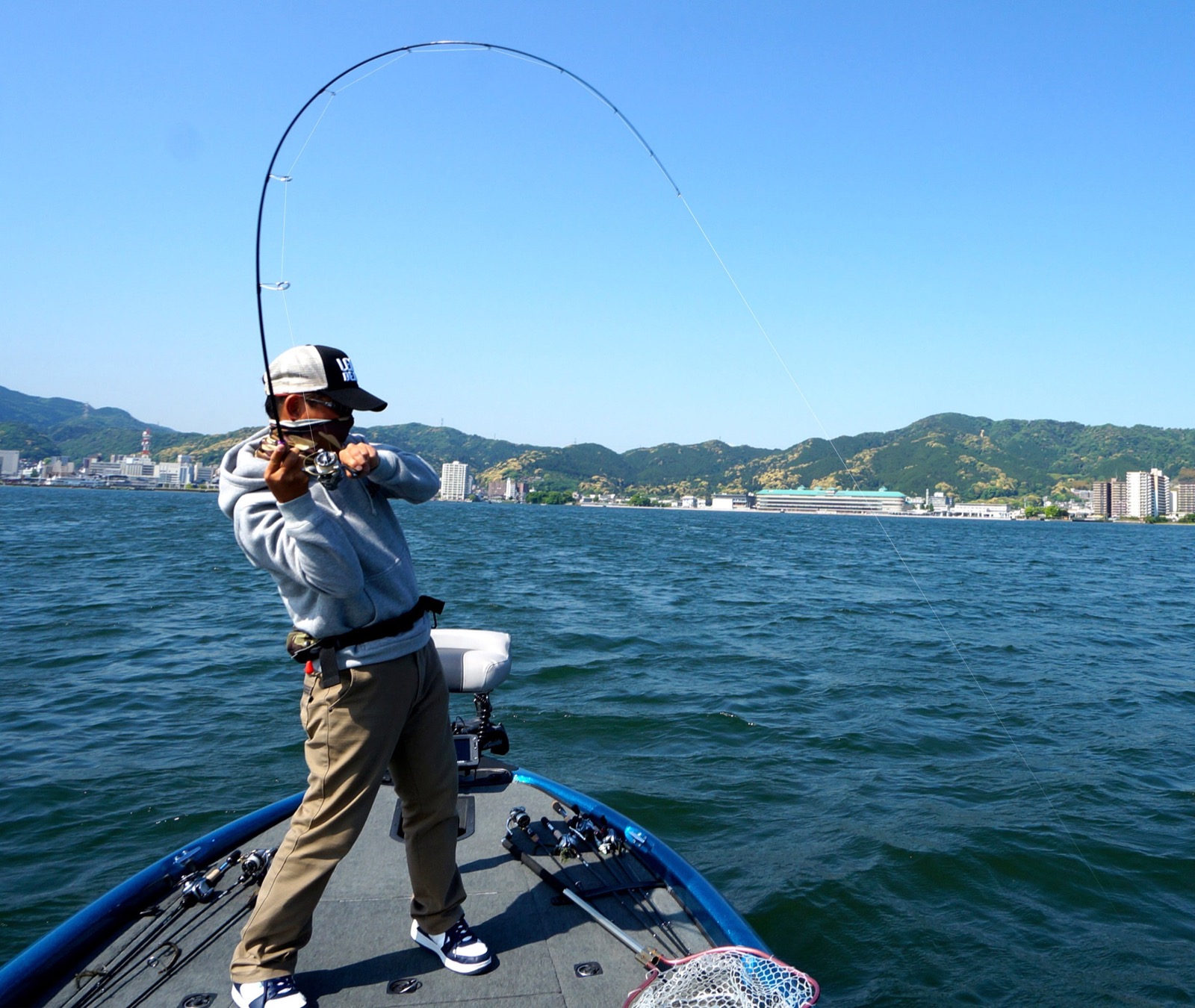 Angler casting a WILD SIDE rod